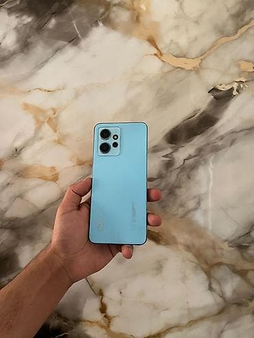 sezam telefonlar: Redmi Note 12, 128 GB, rəng - Mavi, Barmaq izi, Face ID — 7
