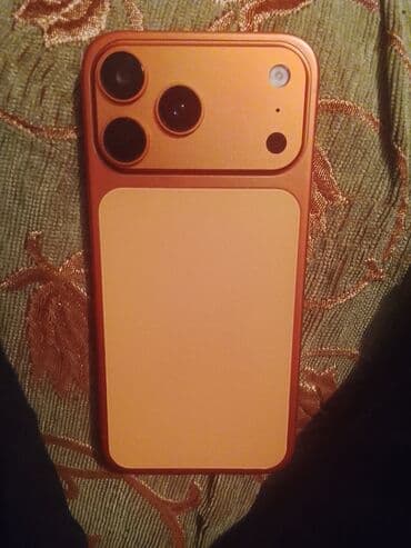 iphone 15 pro maxs: Məhsul: Narıncı rəngdə smartfon Xüsusiyyətlər və dizayn: - Arxa — 1