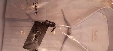 Üst geyimləri: Новая рубашка мужская . 43 размер 
30ман . до тавка м Нефтчиляр — 1