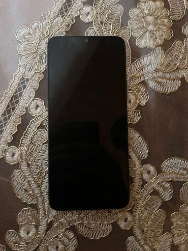 telefon redmi not 9: Qara rəngdə smartfon - Korpus: mat qara arxa panel, küncləri yumrudur — 3