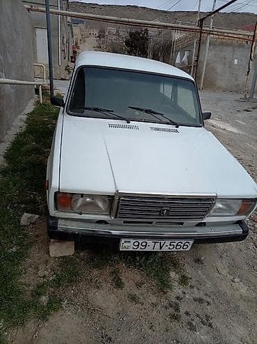 zil 5301 satilir: LADA 2107, ağ rəng, sedan. Texniki xüsusiyyətlər: - Benzin mühərriki — 1