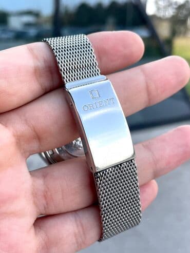 saat gumuş: İşlənmiş, Qol saatı, Orient, rəng - Bənövşəyi — 7