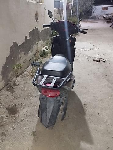 12 volt adapter: Demeli moped on hisseden qeza olunub yanlarında ciziglar var — 8