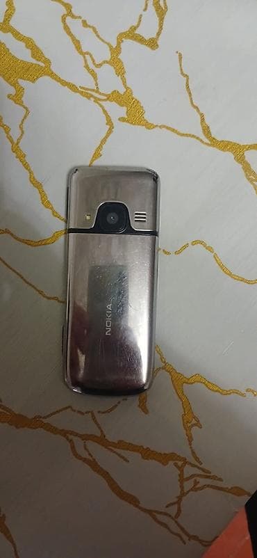 mini telfon: Nokia 6700 Slide, rəng - Boz — 2
