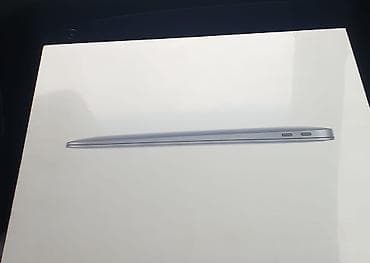 Apple MacBook Air (13") — gümüşü rəngdə, nazik və yüngül dizayn