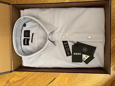 Digər kişi geyimləri: BOSS kişi köynəyi – açıq mavi rəng, klassik düyməli model. - — 1