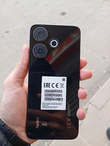 korpuslar: Redmi smartfon - Rəng: qara, parlaq korpus - Arxa paneldə 2 əsas — 2