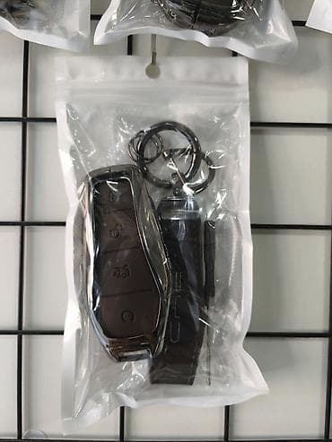 Avtomobil açarı üçün dəri qoruyucu örtük və asqı dəsti Xüsusiyyətlər