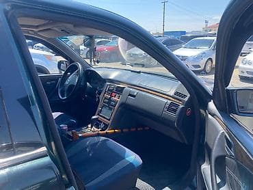 siqaret tutunu: Mercedes-Benz E‑Class (W210) sedan - Korpus: qara/yaşıl tünd rəngli — 2