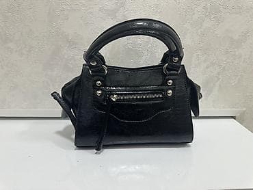 orginal canta: Qara mini əl çantası yenidi istifade edilmeyb paketindedi - Material — 1