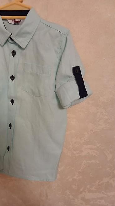 Bayram kostyumları: Uşaq köynəyi – açıq mavi rəngdə, uzunqollu, klassik yaxalı model. Ön — 5