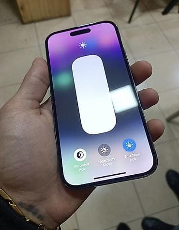 16 sadə: IPhone 14 Pro, Deep Purple, Face ID — 3