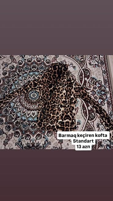 Leopard naxışlı “barmaq keçirən” qadın koftası. - Standart ölçü — 1