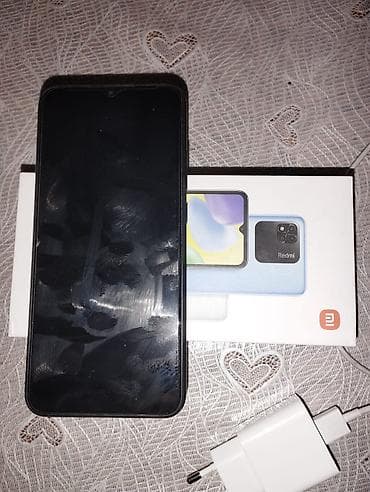 telfon sade: Xiaomi 32 GB, rəng - Qara, 
 İki sim kartlı — 6
