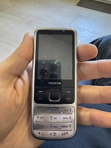 Nokia 6700 Slide, rəng - Gümüşü, Düyməli lalafo.az -da Nokia 6700 Slide, rəng - Gümüşü, Düyməli