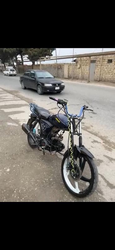 Moped tipli motosiklet – şəhər içi gediş üçün yığcam və yüngül model