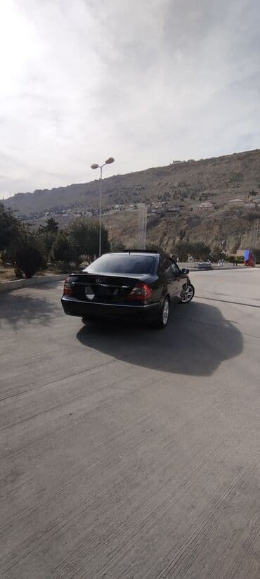 bmw 7 серия 725tds at: Mercedes-Benz E 220: 2.2 l | 2007 il Sedan — 10