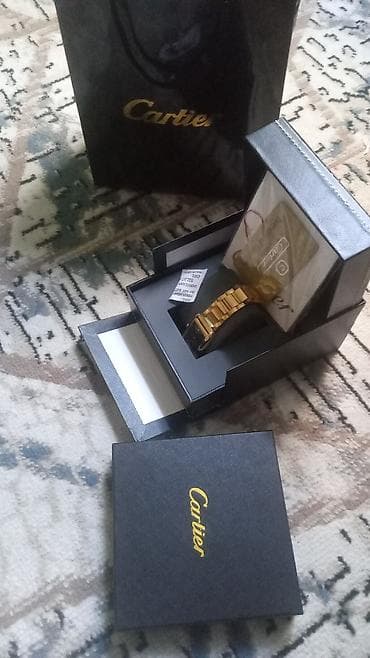 bil: Brend: Cartier (qutu və aksesuarlarla) Model: Düzbucaqlı kadranlı — 4