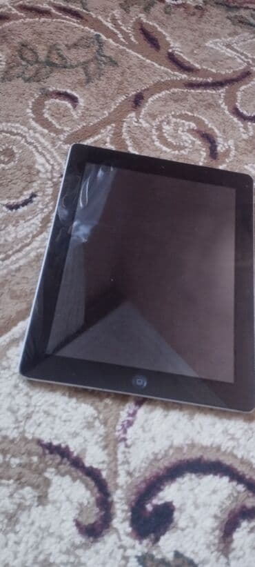 samsung tab s2 qiymeti: Apple iPad planşet - Model: iPad (arxa qapaqda “iPad” yazısı və — 1
