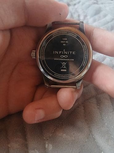günüş saat: Infinite Z qol saatı – minimalist klassik dizayn. Xüsusiyyətlər: - — 2