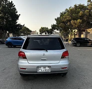 audi a7: Mitsubishi Airtrek (stansiya/wagon kuzov) – gümüşü rəng Texniki — 2