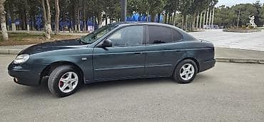 bmw kohne model: Daewoo Leganza: 2 l | 1998 il Sedan — 4
