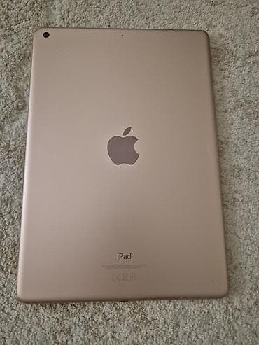 ipad 12 pro max qiymeti: Bu, Apple iPad planşetidir. Cihazın arxasında tanınan Apple loqosu var — 2