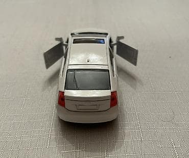 oyuncaq masin type 1: Ağ rəngli oyuncaq avtomobil modeli - Ölçü: təxminən 1:32–1:36 miqyas — 5