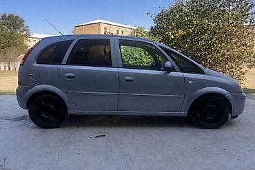 fort az: Opel Meriva, gümüşü rəng, kompakt miniven. Texniki və komplektasiya — 5