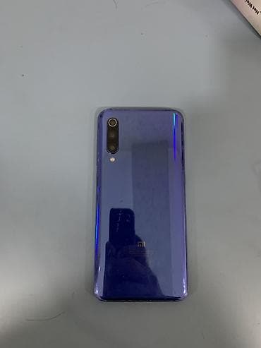 azercell paketleri: Xiaomi Mi 9, rəng - Göy, 
 Barmaq izi — 2