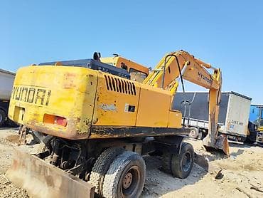 qosqu ev: Hyundai təkərli ekskavator Xüsusiyyətlər: - Marka/model: Hyundai — 1