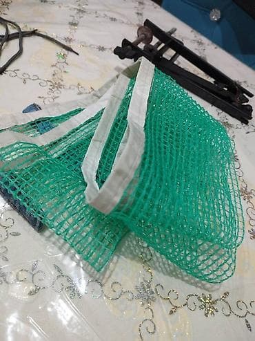 Ideal vəziyyətdə stolüstü tenis setkası, 2 ədəd raketka, 5 ədəd şar