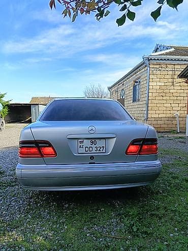 06 təkəri: Mercedes-Benz E 320: 3.2 l | 2000 il Sedan — 6