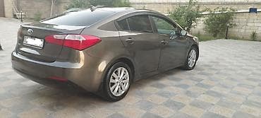 авто руль: Kia Forte: 1.8 л | 2013 г. Седан — 6
