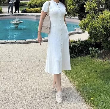 Plaşlar: Ağ rəngli zərif trikotaj midi don

Sandro markasidi — 2