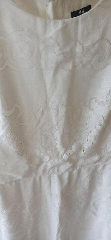 Ağ paltar,44 razmer,H&M firması,çox az geyinilib,30 manat — 2