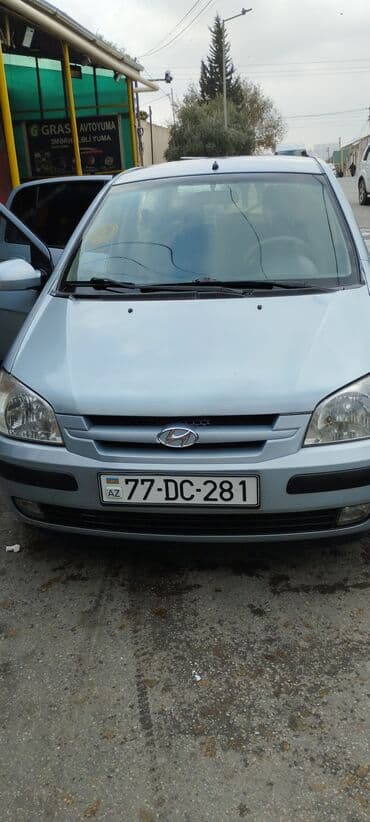 Кулоны и подвески: Hyundai Getz, gümüşü rəng, 5 qapılı hetçbek. Xüsusiyyətlər: - Xarici — 2