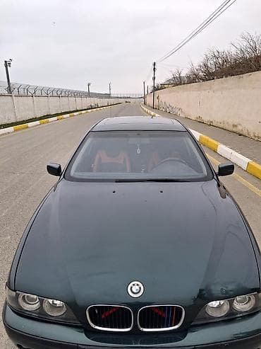 disqi teker mersedes: BMW 5 series: 2.8 l | 1997 il Sedan — 7