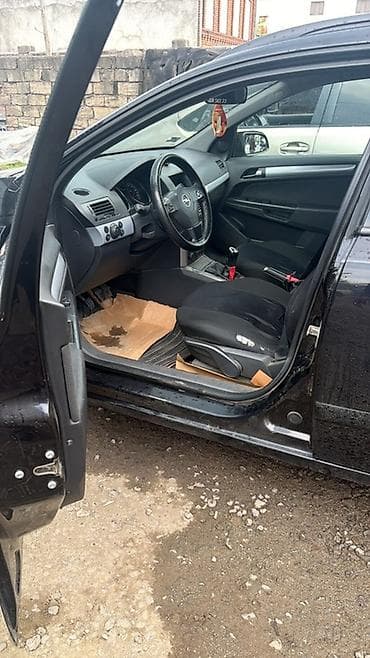 kia optima 2 sade mator: Opel Astra: 1.3 l | 2006 il Universal — 3