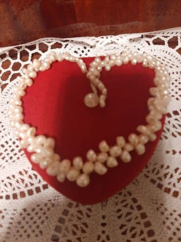 Mirvari Boyunbağı.Əl işidir.Cox gözəl görünüsüvar.Boyunbagi tək öžü