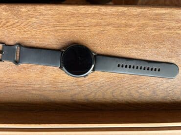 андроид мониторы для prado: Ağıllı saat – dairəvi ekranlı, qara korpuslu model. Xüsusiyyətlər: - — 1