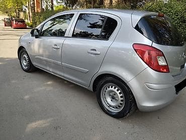 kuba portero 8000: Opel Corsa D, 5 qapılı hetçbek, gümüşü rəng. Texniki xüsusiyyətlər: - — 8