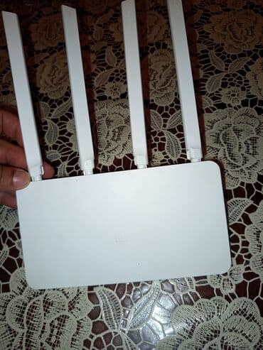 həyət evləri üçün internet: Xiaomi Wi-Fi routeri, dörd xarici antenası ilə stabil və geniş əhatəli — 4