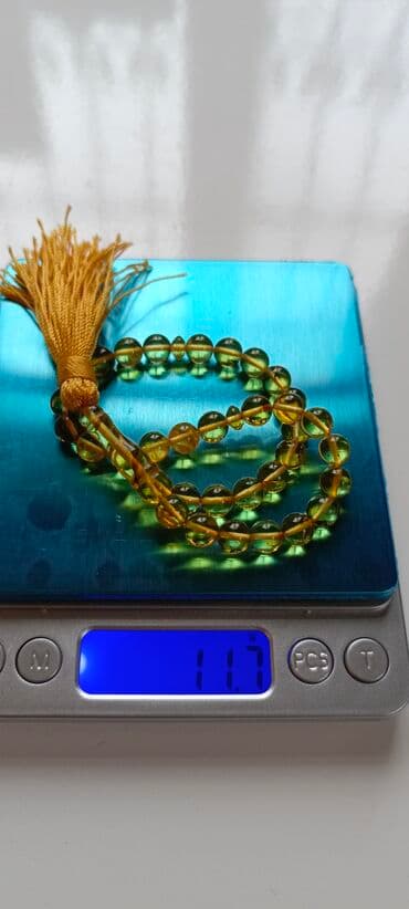 yun koftalar: Təsbeh – kiçik kəhrəba muncuqlu, şəffaf limon tonlarda.Bütöv — 5