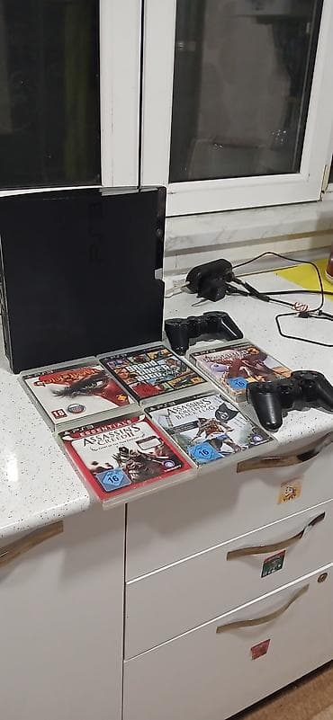 Məişət texnikası: PlayStation 3 (PS3) Slim komplekti Paketə daxildir: - PS3 Slim — 2