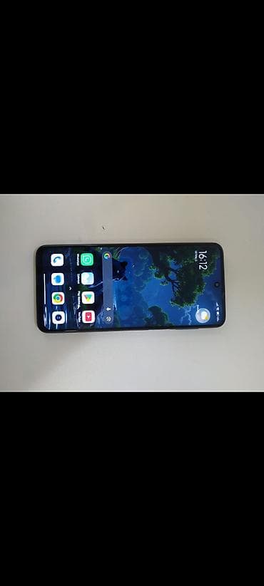 Xiaomi 64 ГБ, цвет - Голубой, 
 Отпечаток пальца — 2