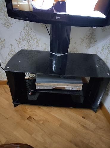 Видеоигры и приставки: Qara şüşə televizor altlığı. İşlənib, amma yaxşı vəziyyətdədir. Heç — 1