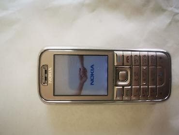 ТВ и видео: Nokia цвет - Коричневый, Кнопочный — 3