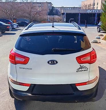 meqan 2: Kia Sportage: 2 l | 2011 il Krossover — 7
