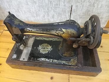 Antik mexaniki tikiş maşını – əl ilə fırladılan - Korpus: tökmə